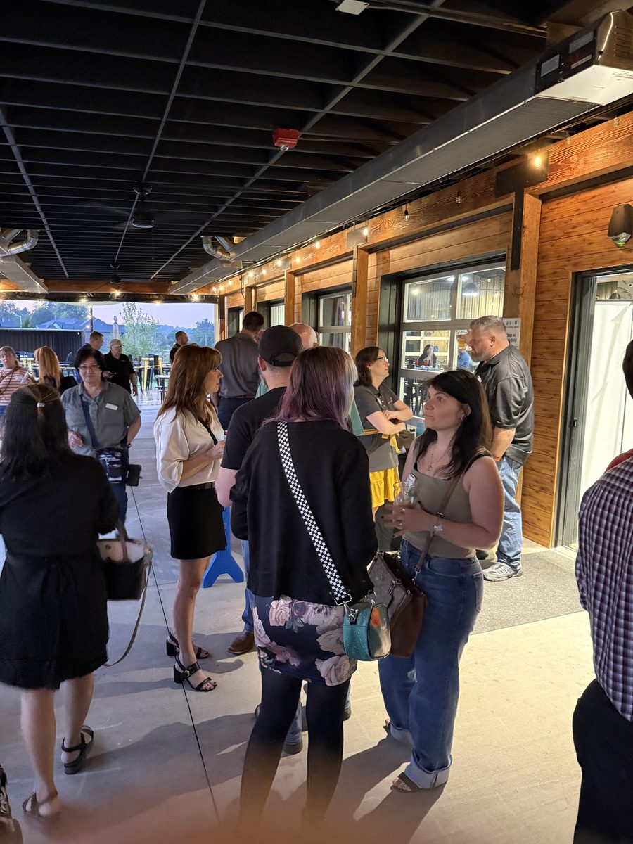 Attendees mingling at the 2025 Self Storage Mixer